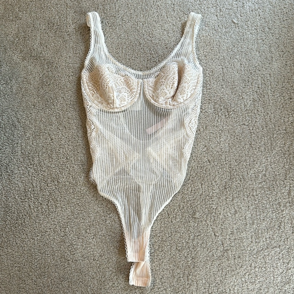 Never worn cream colored lingerie bodysuit